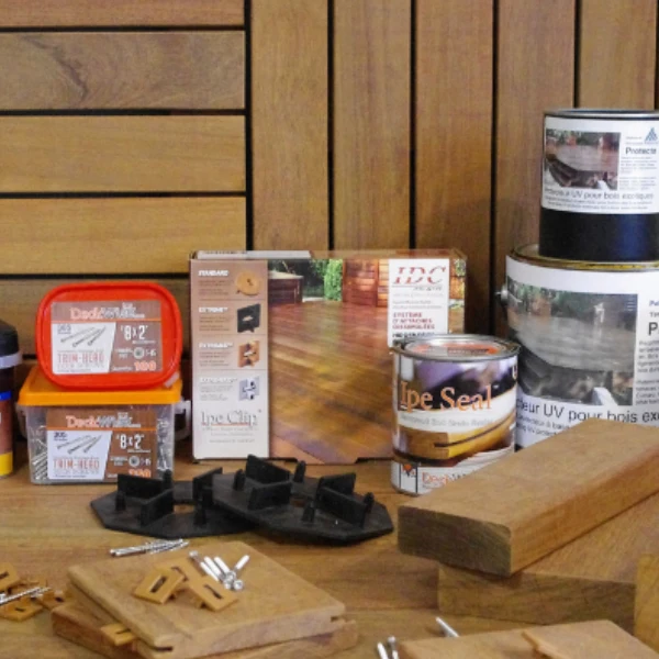 a group of wood pieces and cans of paint